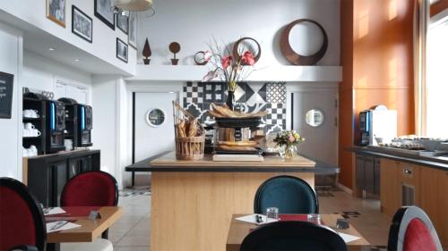 Køkken eller tekøkken på Résidence b'o cottage - b'o resort thermal & spa