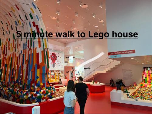 people walking through a lego house in a store at 300 meter walk to LEGO house - 50m2 COZY apartment - unit D in Billund