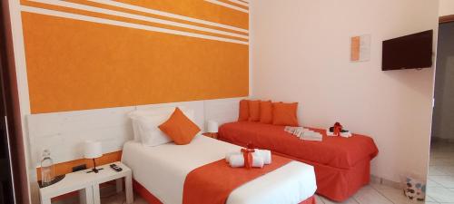 Una cama o camas en una habitación de G&G Giusy e Gabry