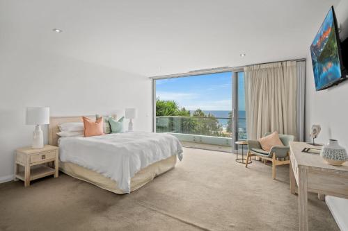 En eller flere senge i et værelse på Avoca Views