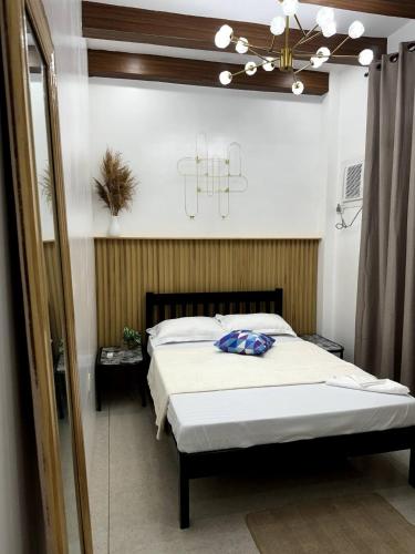 Postel nebo postele na pokoji v ubytování Ohwa's Guesthouse