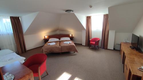 Postel nebo postele na pokoji v ubytování Hotel Vion