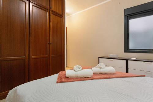 Letto o letti in una camera di Apartamento Romo