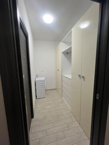 a hallway of a bathroom with a walk in shower at Da Gianna in Rivalta di Torino
