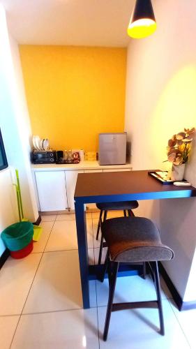 a desk with a chair in a room at Sunset View 969 PD Waterfront in Port Dickson