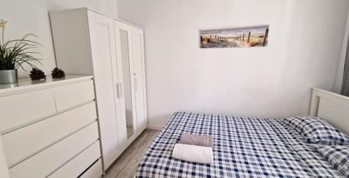 Letto o letti in una camera di Krolewska Centrum apartament 4X
