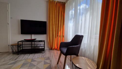 TV o dispositivi per l'intrattenimento presso Krolewska Centrum apartament 4X