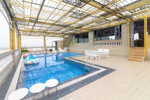 Πισίνα στο ή κοντά στο Pearl Beach Hotel Quy Nhon