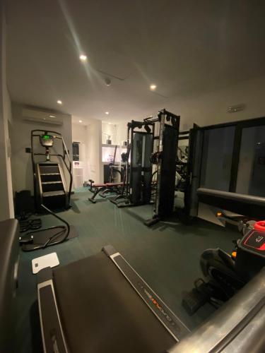 a gym with several equipment in a room at Nacala Plaza Business Design Hotel in Cidade de Nacala
