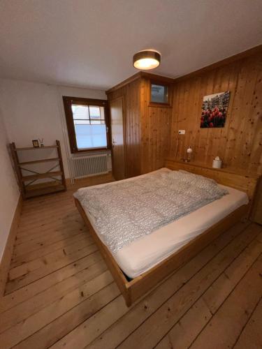 Postel nebo postele na pokoji v ubytování Große gemütliche Ferienwohnung in Schwarzwaldhof