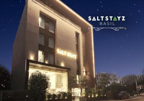 a building with a sign that reads sashaashaashaashaashaisel at Saltstayz Basil - Near Golf Course Road & Extension Road in Gurgaon