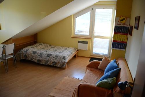 Postel nebo postele na pokoji v ubytování Apartments Tatran Donovaly
