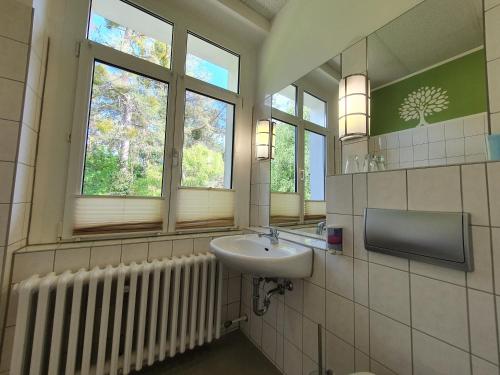 Koupelna v ubytování Waldhotel am See Berlin-Schmöckwitz