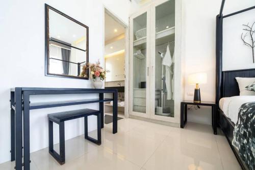 Ένα ή περισσότερα κρεβάτια σε δωμάτιο στο Patong WiN HOUSE Villa