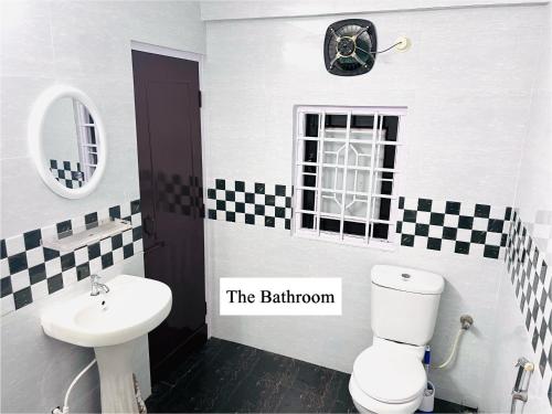 Koupelna v ubytování Okum Guest House