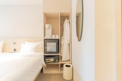 Cama o camas de una habitación en Hotel Myeongdongjang