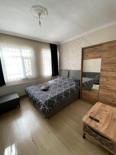 Postel nebo postele na pokoji v ubytování ilkim&derin suite