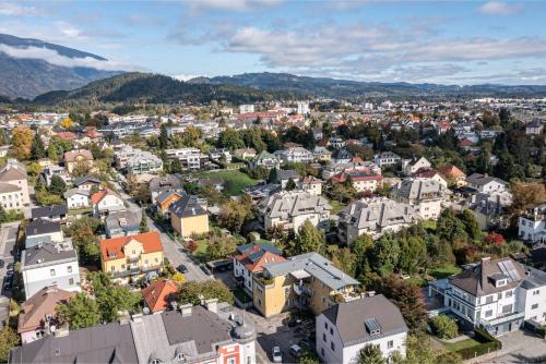 an aerial view of a city with houses at Stadtapartments Luna by Cosy Homes in Villach