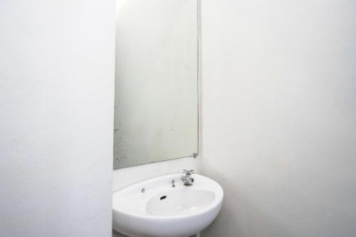 Ένα μπάνιο στο Nostos Guesthouse Wonosobo