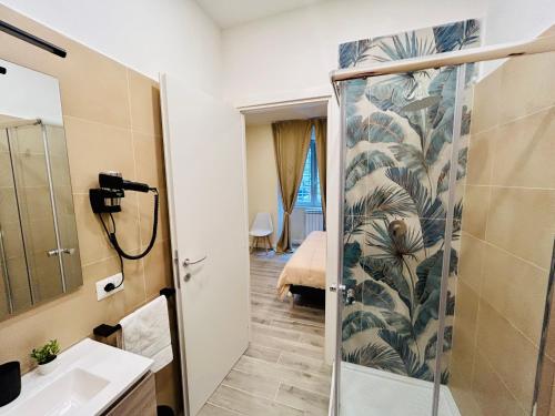 a bathroom with a shower and a sink at Domus Altino in Rome