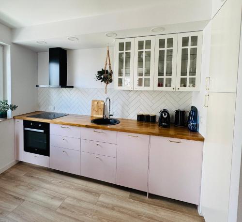 Kuchyňa alebo kuchynka v ubytovaní Bochenka Apartments II