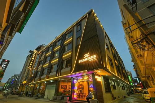 a building on a city street at night at Airport Le Premier, New Delhi in New Delhi