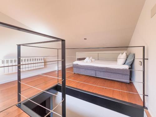 a bedroom with a bunk bed and a glass staircase at Majordoms - Cal Sabater in Las Escaulas