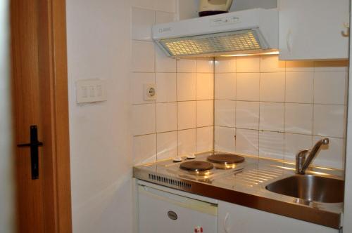 Kuchyňa alebo kuchynka v ubytovaní Apartments and Rooms Ljuba
