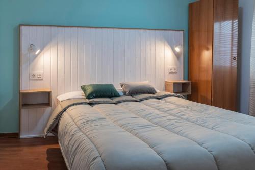 Hostal Julio Cesarにあるベッド