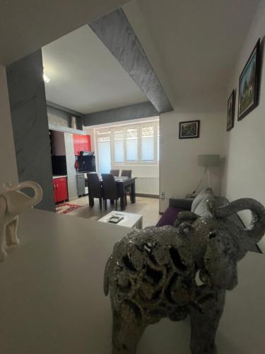 a view of a living room with an elephant statue at The GREEN FAMILY paradise in Čajetina