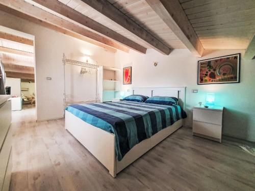 Ένα ή περισσότερα κρεβάτια σε δωμάτιο στο Apartment Casa di Arianna by Interhome