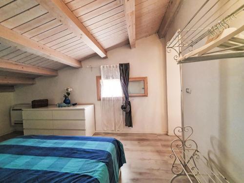 Ένα ή περισσότερα κρεβάτια σε δωμάτιο στο Apartment Casa di Arianna by Interhome