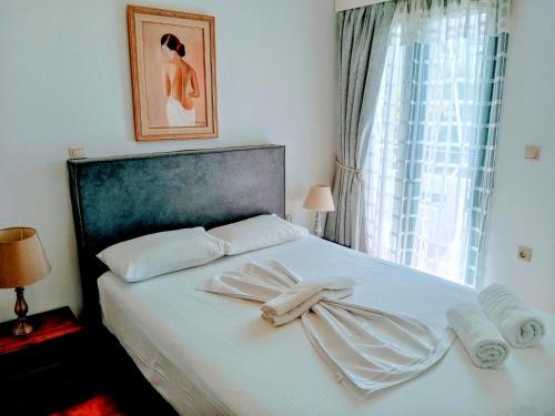 Posteľ alebo postele v izbe v ubytovaní Ostria Apartments Kalives