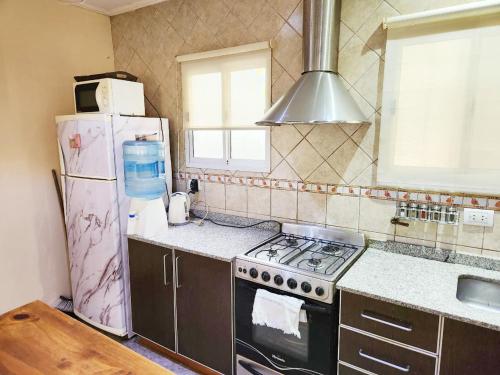 Kuchyň nebo kuchyňský kout v ubytování Departamento La Estación de Los Toldos