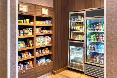 a refrigerator filled with lots of food and drinks at Fairfield Inn & Suites by Marriott Moncton in Moncton