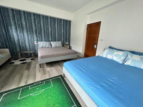 Ein Bett oder Betten in einem Zimmer der Unterkunft Little glass yard B&B