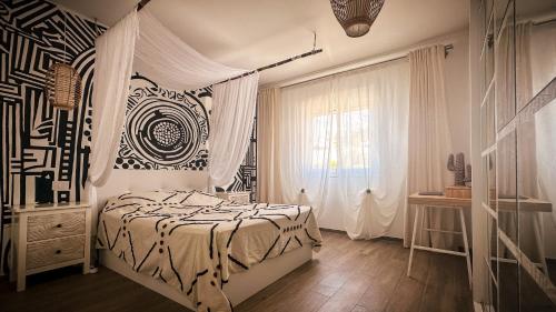 Ένα ή περισσότερα κρεβάτια σε δωμάτιο στο Tenerife Dream View Apartment