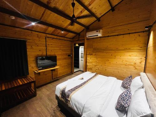 Postel nebo postele na pokoji v ubytování Seclude Eco Cottages