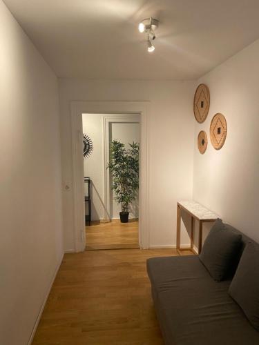 a living room with a couch and a table at Apartments in Zelgstrasse-Zurich in Zürich