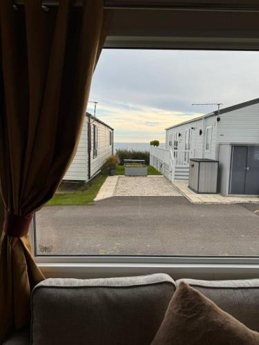 a view from a window of a building at Holiday home in Durdle door with stunning Sea view in West Lulworth