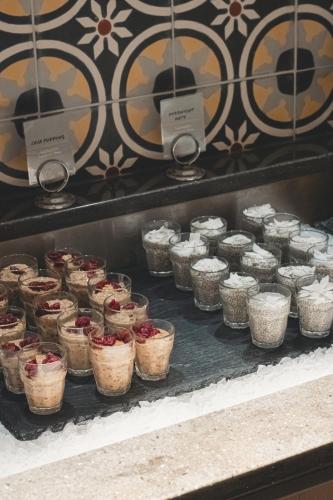 a display of cupcakes in baskets on a shelf at Comfort Hotel Norrköping in Norrköping