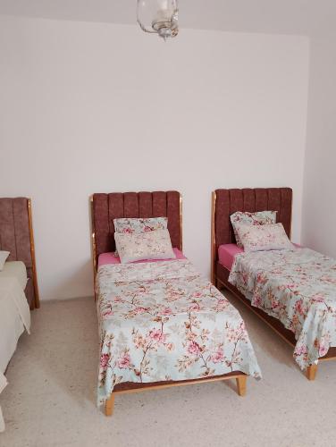 Letto o letti in una camera di Dar ettawfik