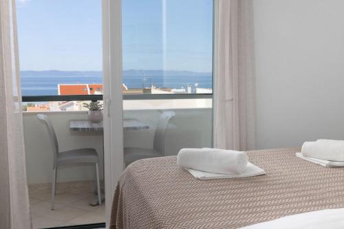 Posteľ alebo postele v izbe v ubytovaní Apartments Gianni