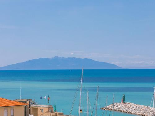 a view of the ocean with boats in the water at Apartment Franca by Interhome in San Vincenzo