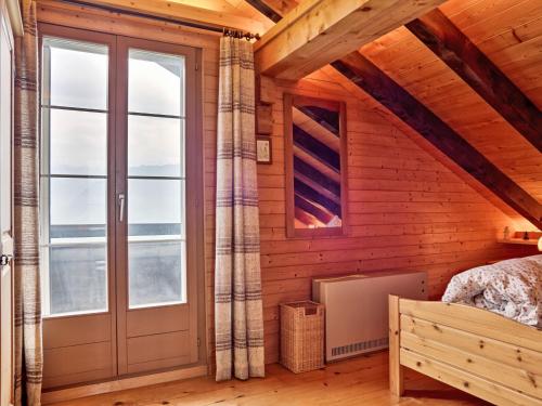 Ein Sitzbereich in der Unterkunft Holiday Home Chalet Zun 6B by Interhome