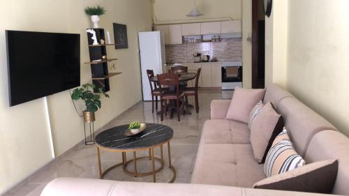 Η κουζίνα ή μικρή κουζίνα στο Alex Apartment