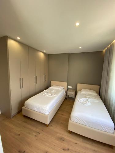 Ένα ή περισσότερα κρεβάτια σε δωμάτιο στο Erioni Hotel