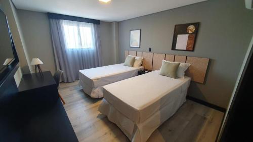 Cama o camas de una habitación en Tulip Inn Bauru