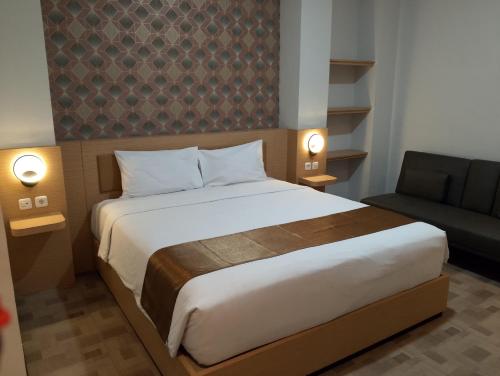 Katil atau katil-katil dalam bilik di Grand Plaza Suites