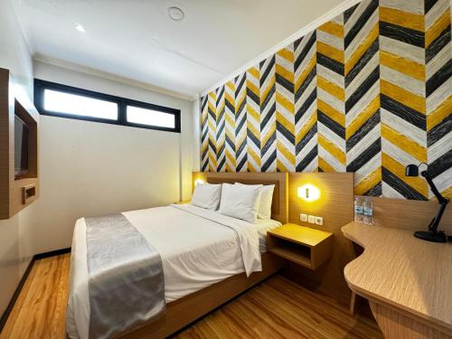 Katil atau katil-katil dalam bilik di Grand Plaza Suites